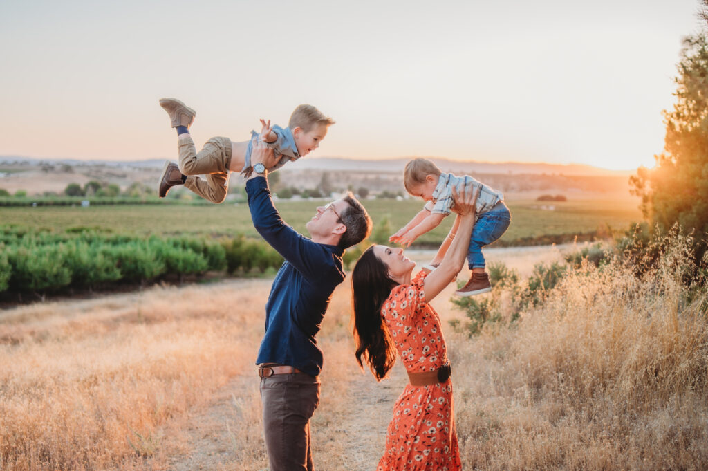 Family session in a private apple orchard at Fair Hills Farm in Paso Robles during fall